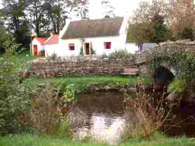 thatched cottage bearing